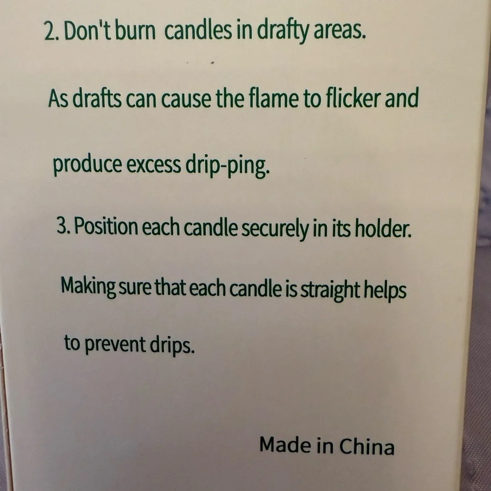 Christmas taper candles with a festive pattern, green 10”